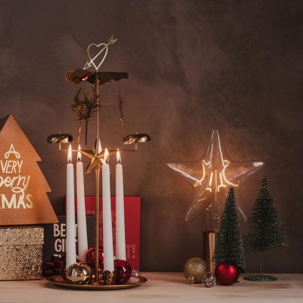 Christmas still life with gifts and advent lights
