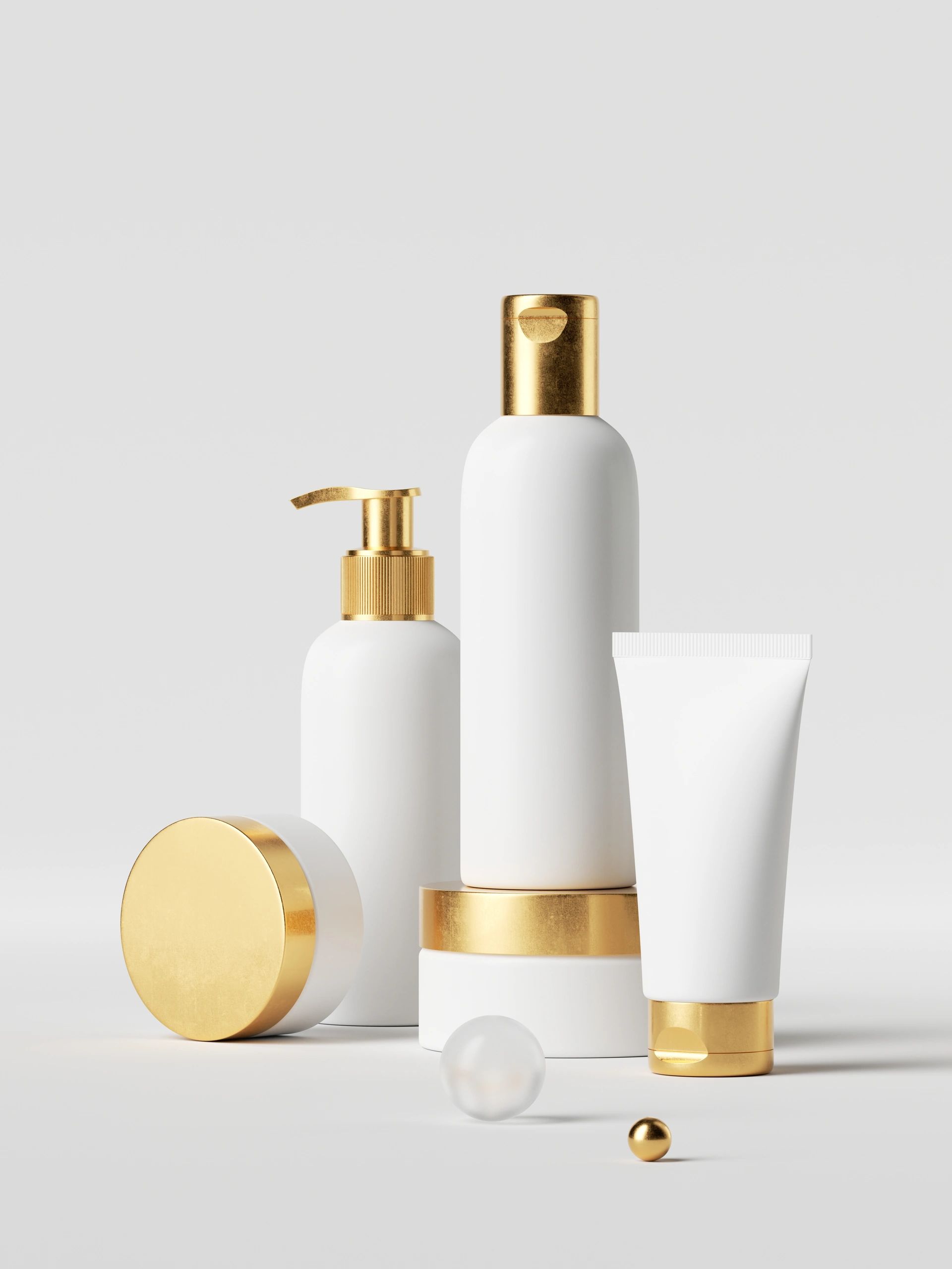 Minimal white skincare products arranged for a beauty ritual