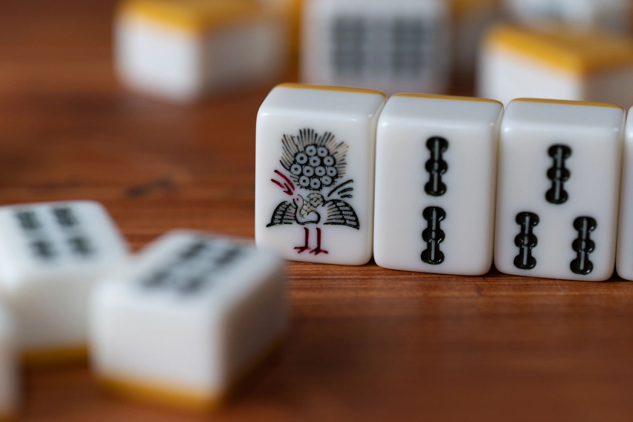 People playing mahjong at a table