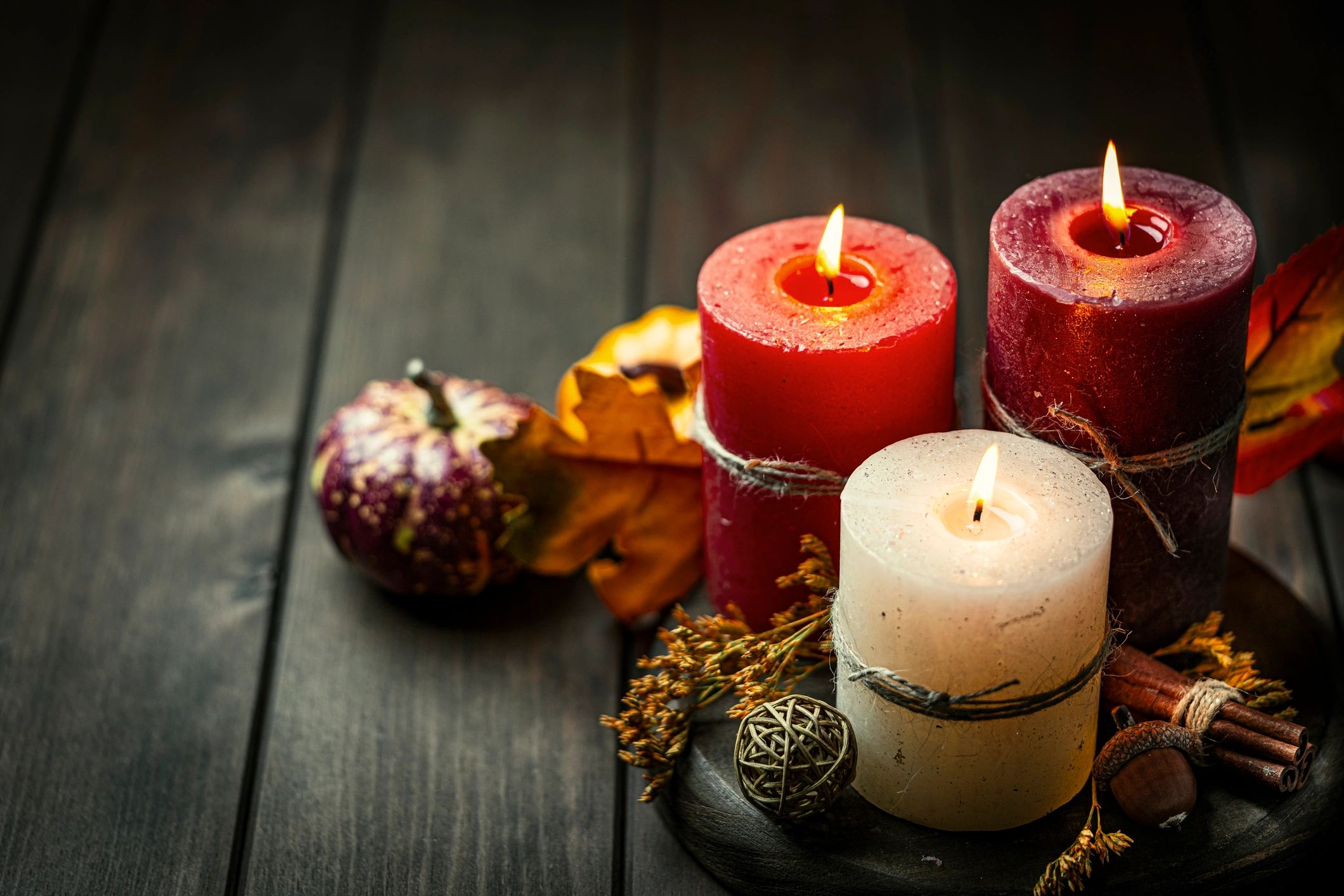 Burning candles arranged for a calming home ritual